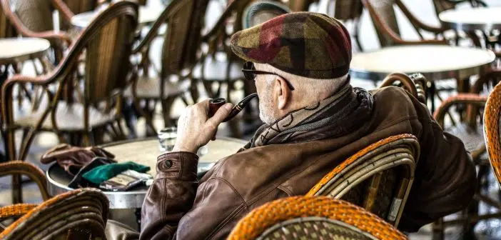 man smoking smoking pipe