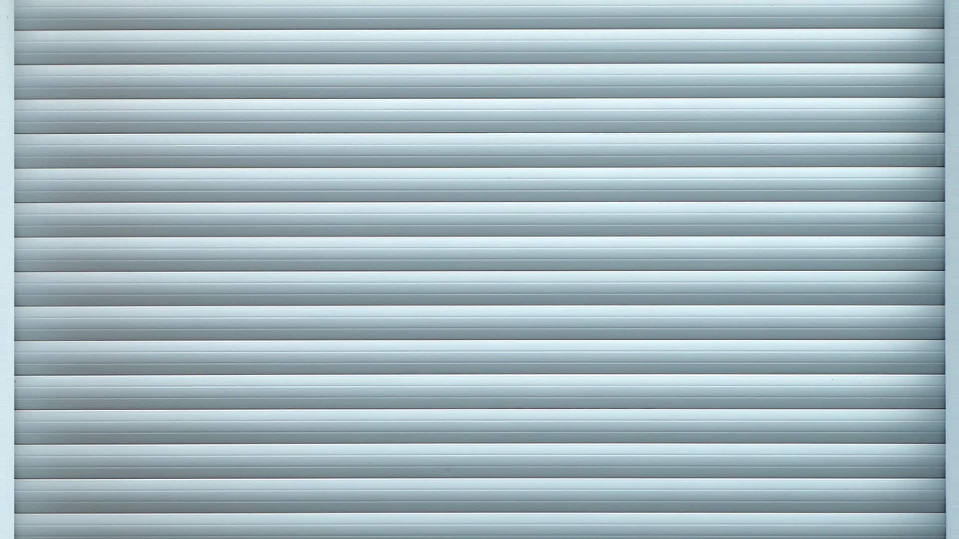 Porte de garage basculante motorisée : pour quelle utilité ?