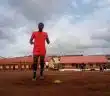 man wearing orange t-shirt