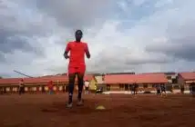 man wearing orange t-shirt