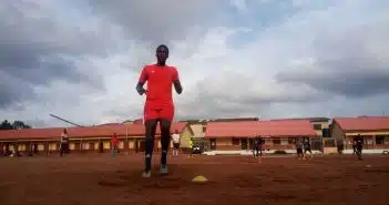 man wearing orange t-shirt